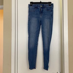 Medium wash high rise skinny jeans